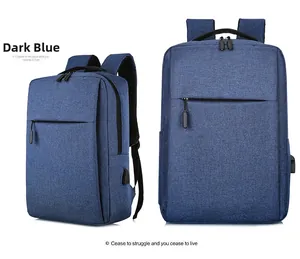 Detail of dark blue business backpack featuring USB charging port and textured fabric