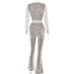 Detail view of the white lace bodysuit with back invisible zipper and bell-bottom pants