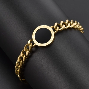 Exaggerated chunky gold chain bracelet with black circular Roman numeral charm