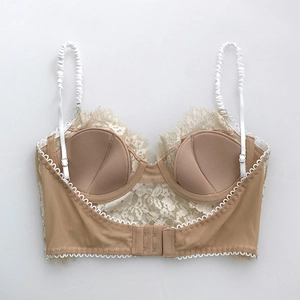 Lace bralette with eyelash trim and open back design in champagne gold and tan
