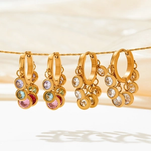Luxury gold tassel earrings with multicolored zircon crystals on hanging display chains