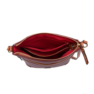 Detailed top view of the brown pebble leather crossbody bag with red fabric lining