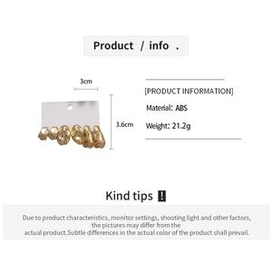 Detailed view of irregular fluid gold-tone ABS earrings with dimensions and weight specs