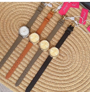 Group of four leather luxury women's watches with diamond bezels and mother-of-pearl dials