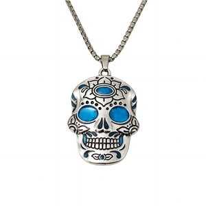 Luminous sugar skull necklace with blue floral engravings for Day of the Dead style