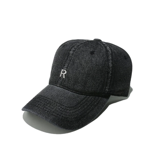 Vintage washed denim baseball cap featuring white R letter embroidery in dark grey