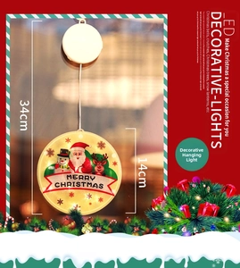 Detail of 14cm LED Santa hanging light with round glass design and Merry Christmas text