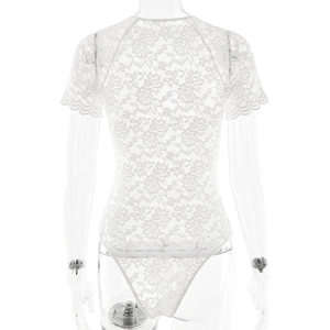 Rear view of white lace bodysuit with floral patterns and high cut design on a mannequin
