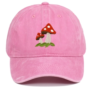 Pink washed cotton baseball cap with vintage mushroom embroidery on white background