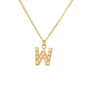 Detailed close-up of golden letter W pendant necklace adorned with white small pearls