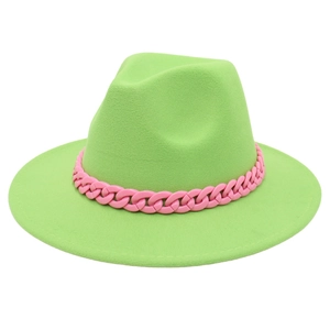 Detail of neon green fedora hat featuring a chunky pink chain trim on a wide brim