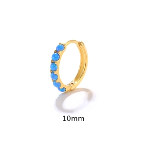 Detail view of 10mm gold huggie earrings featuring five round blue opal stones