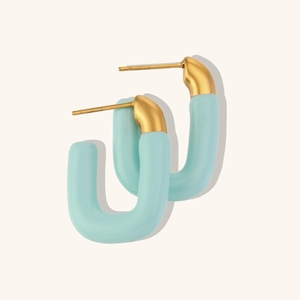 Detail of U-shaped earrings with 18K gold plating and blue enamel matte coating