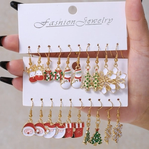 Detail of 6-pair Christmas earring set with Santa, Snowman and Reindeer alloy designs