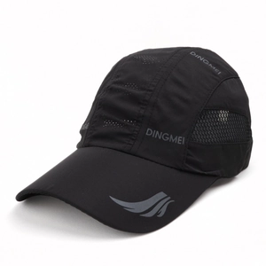 Detail of black quick-dry mesh fabric and breathable laser holes on sports baseball cap