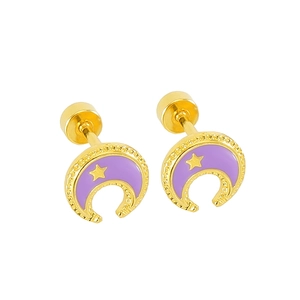 Close-up of crescent moon earrings with purple enamel and golden star detailing