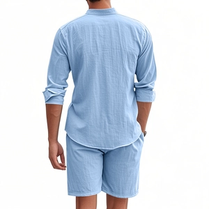 Back view of men's light blue linen shirt and shorts set showing fabric texture and fit