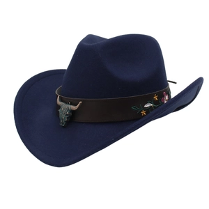 Detailed view of navy blue felt cowboy hat with leather belt and bull head metal accessory