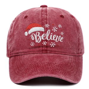 Red washed cotton baseball cap with embroidered Christmas hat and Believe text