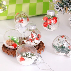 Set of clear Christmas baubles with pine cones and red berries on festive holiday background