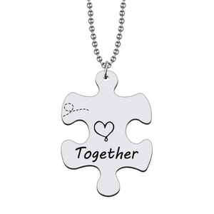 Polished puzzle piece pendant with Together engraving and a classic ball chain