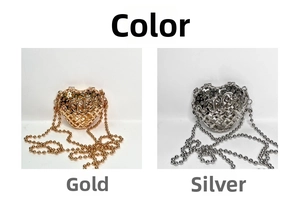 Detail view of woven heart-shaped metal mini bags in gold and silver with bead chains