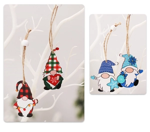 Close-up of wooden Christmas gnome pendants with colorful plaid patterns on branches