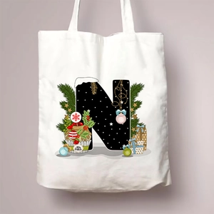 White canvas tote bag featuring Christmas letter N and festive Merry Christmas design