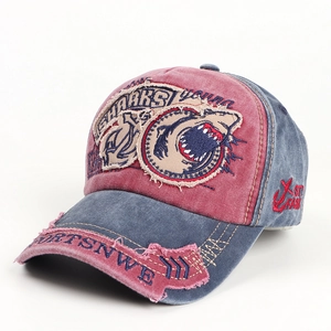 Detailed view of vintage washed denim baseball cap with distressed SHARKS embroidery patches