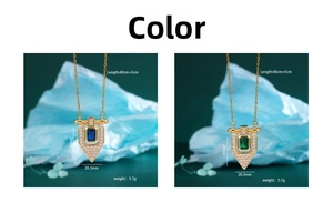 Detailed specs of geometric shield pendants with blue and green gems and white zircons