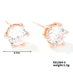 Detail view of 7mm rose gold stud earrings with cubic zirconia and size dimensions