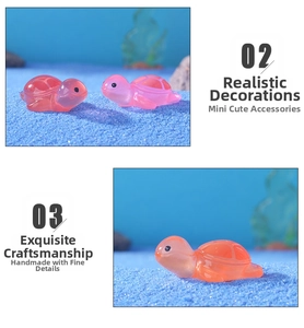 Dettaglio di graziose tartarughe in resina arancione e rosa per micro decorazione