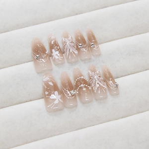 Handmade autumn butterfly press-on nails with 3D floral accents and pearls in brown gradient