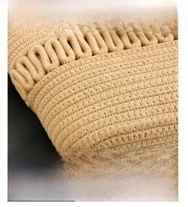 Macro shot of intricately woven straw handbag detail with rustic spiral textures