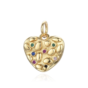Gold heart pendant necklace with colorful zircons and textured finish on white background