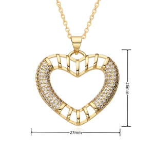 Detailed view of a gold heart pendant with white zircons showing 27mm and 25mm dimensions