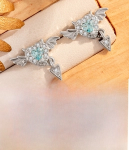 Detailed specs of heart angel wing cartilage earring with blue zircon and titanium steel