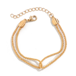 Detail of multi-layer gold and silver layered necklace with lobster clasp and chain