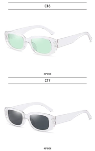 Detailed 45-degree side view of translucent rectangle sunglasses in green and grey lenses