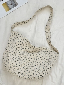 Large capacity floral canvas hobo bag with blue flower pattern and wide shoulder strap