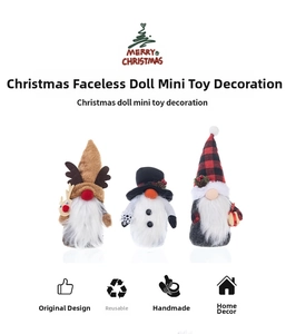 Detailed view of handmade Christmas gnomes with plaid hats and plush reindeer antlers