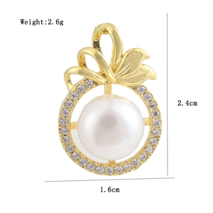 Macro shot of 18K gold plated pearl pendant with bow design and size dimensions