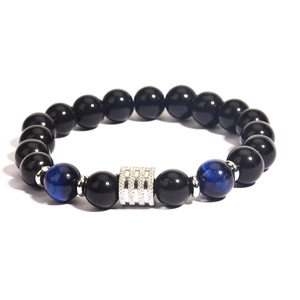 Men's beaded bracelet with black obsidian, blue tiger eye stones, and silver metal charm