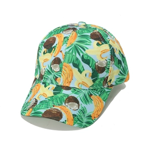 Blue canvas baseball cap with tropical fruit prints featuring banana coconut and palm leaf