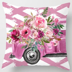 Detail of pink vintage truck and watercolor roses printed on decorative pillow cover