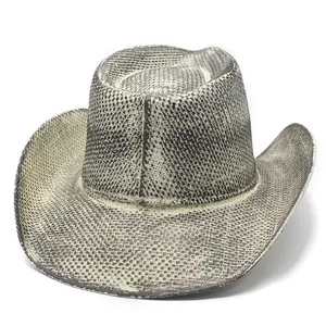 Detail of the woven texture on a wide brim Western cowboy hat with a mottled pattern