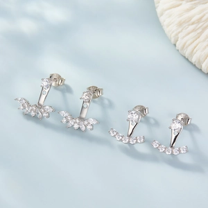 Detailed view of S925 sterling silver earrings with zircons showing the hallmark stamp