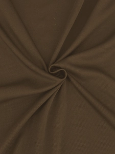 Close-up of breathable dark brown pineapple grid knit fabric with soft texture