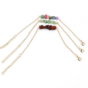 Three variants of natural crystal stone bracelets with gold chains and lobster clasps