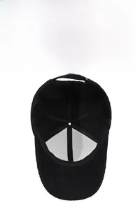 Interior detail of black corduroy baseball cap with breathable lining and stitching